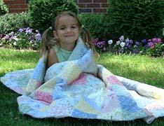 thumbs/s3allashawithquilt.JPG.jpg