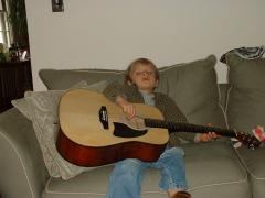 thumbs/XMasEmmonPlayingGuitar2.JPG.jpg