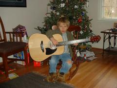thumbs/XmasEmmonPlayingGuitar3.JPG.jpg